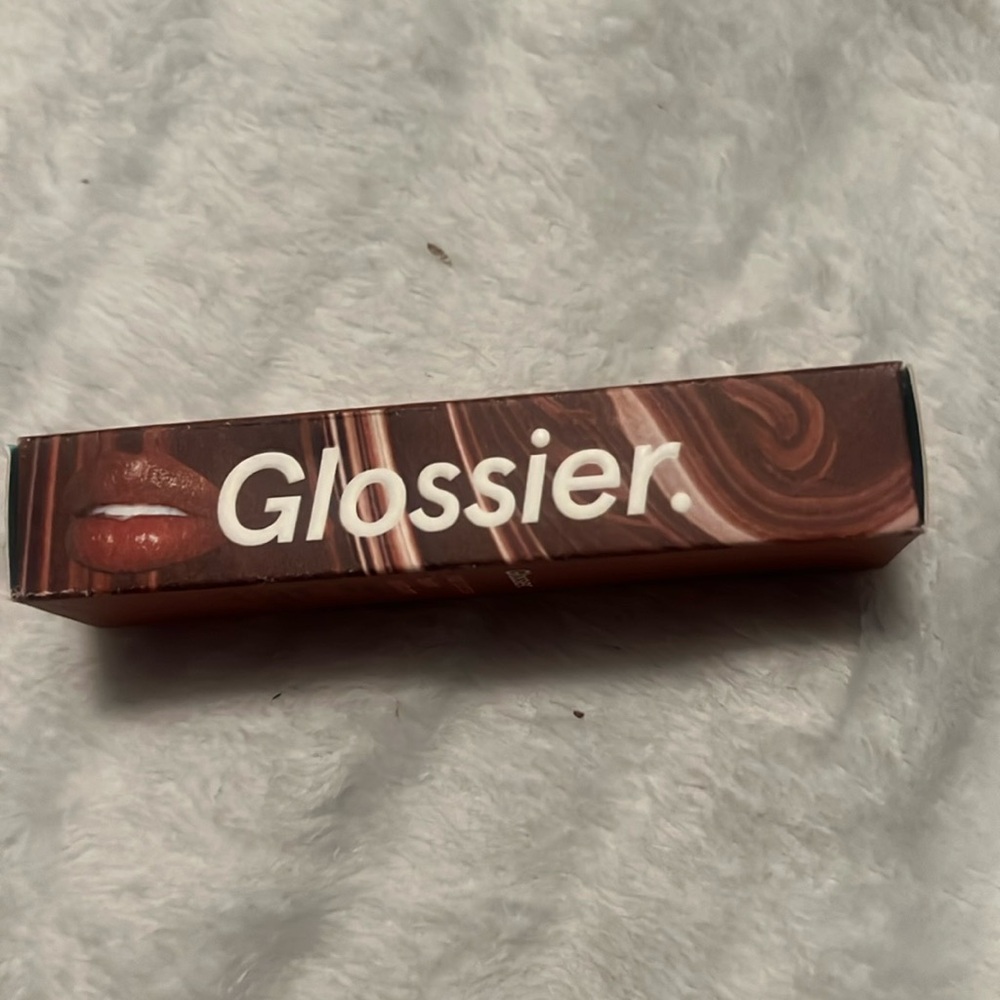 Limited addition hot cocoa glossier lil balm.